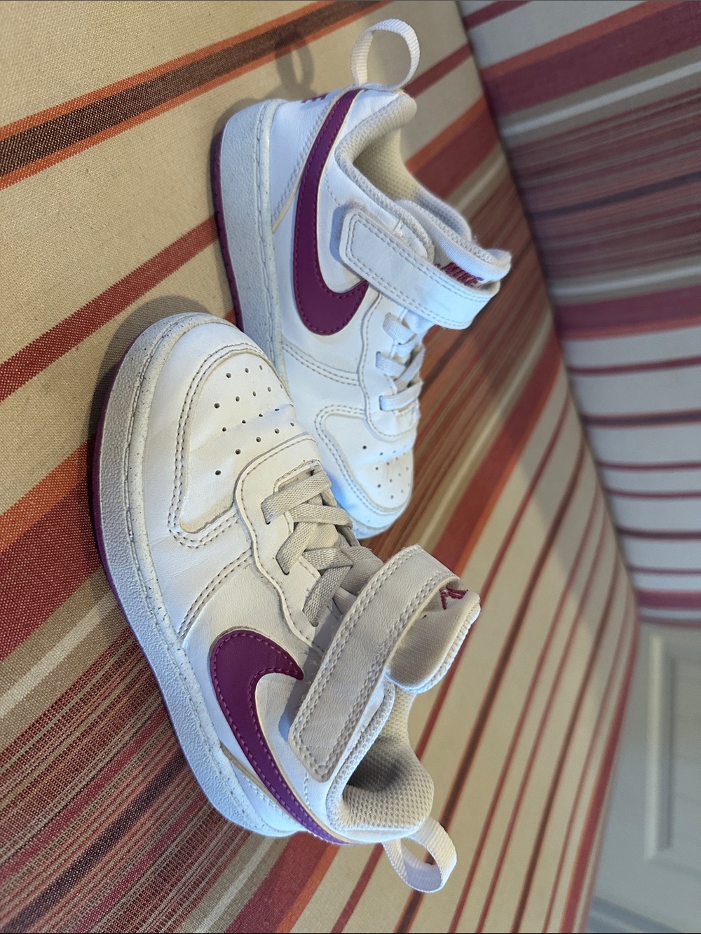 Nike Kids White Sneakers with Purple Swoosh